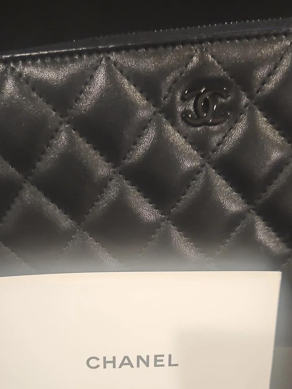CHANEL Black Quilted Leather Clutch with CC Logo